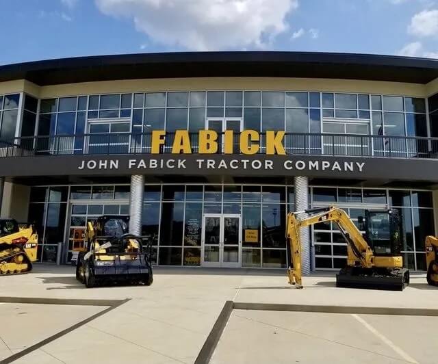 John Fabick Tractor Company building with heavy machinery.